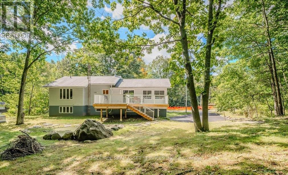 Rear of home in forest